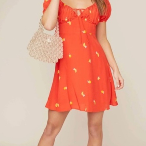 Orange Puff Sleeve Dress with Floral Accents - Picture 2 of 3